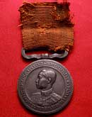 เหรียญแพรแถบที่ระลึกเสด็จเถลิงราชมไหศวรรยสมบัติบรมราชาภิเษก พระบาทสมเด็จพระปกเกล้าเจ้าอยู่หัว (รัชกาลที่ 7) ปี2468